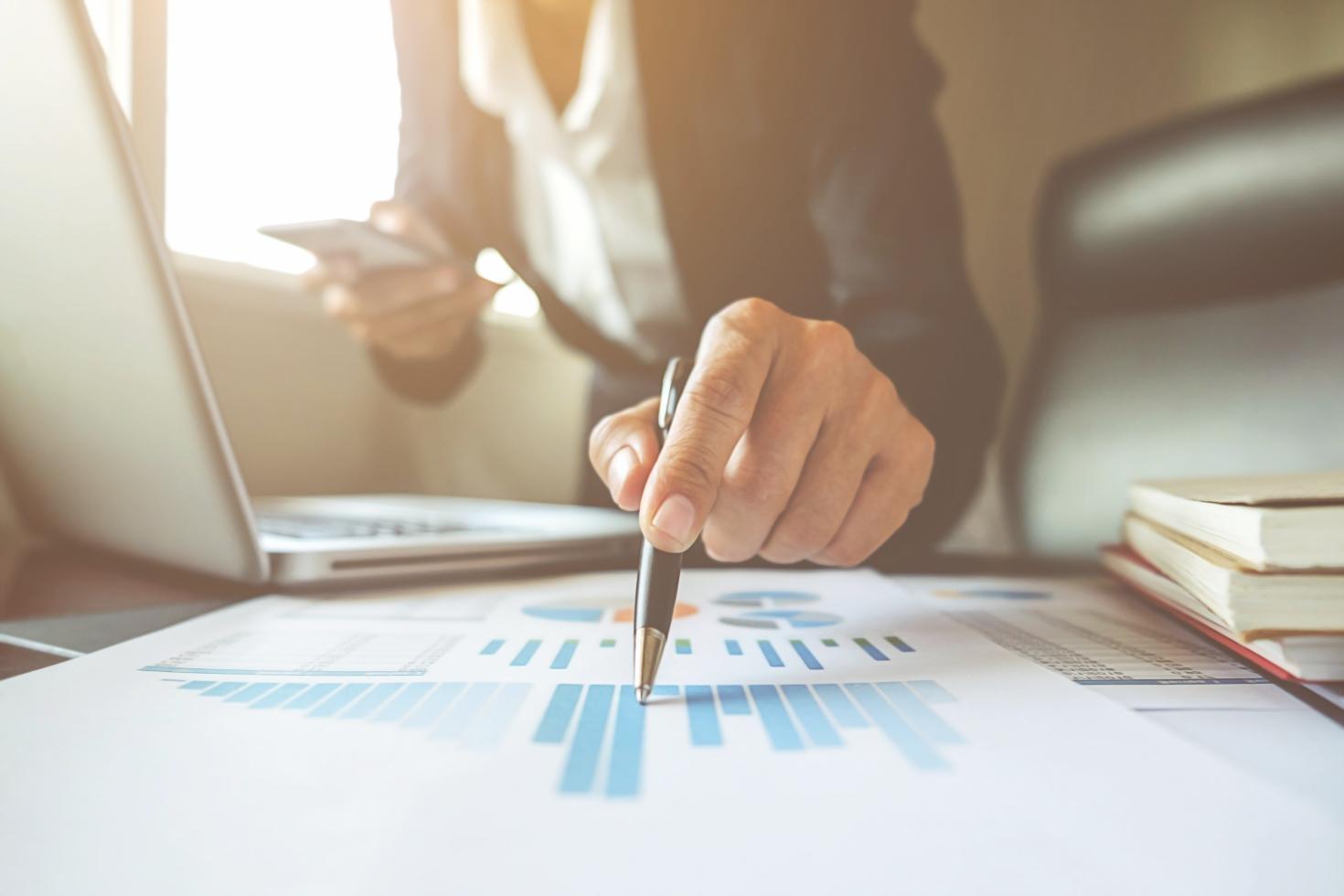 Modern web design workspace with multiple screens displaying interface designs