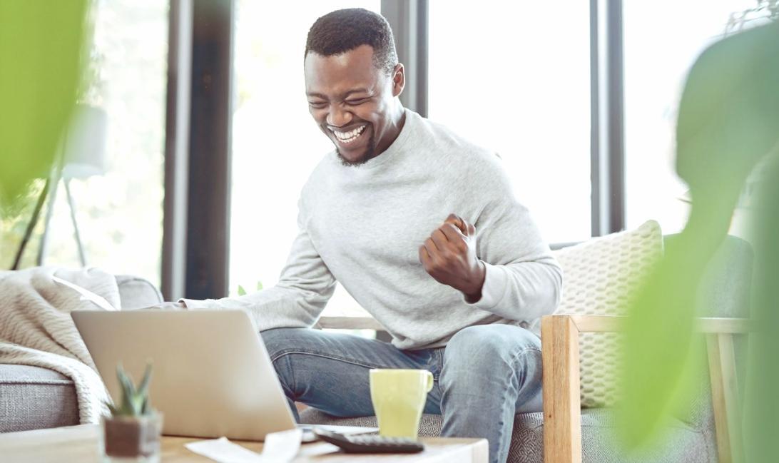 Designer workspace with digital tools and planning materials